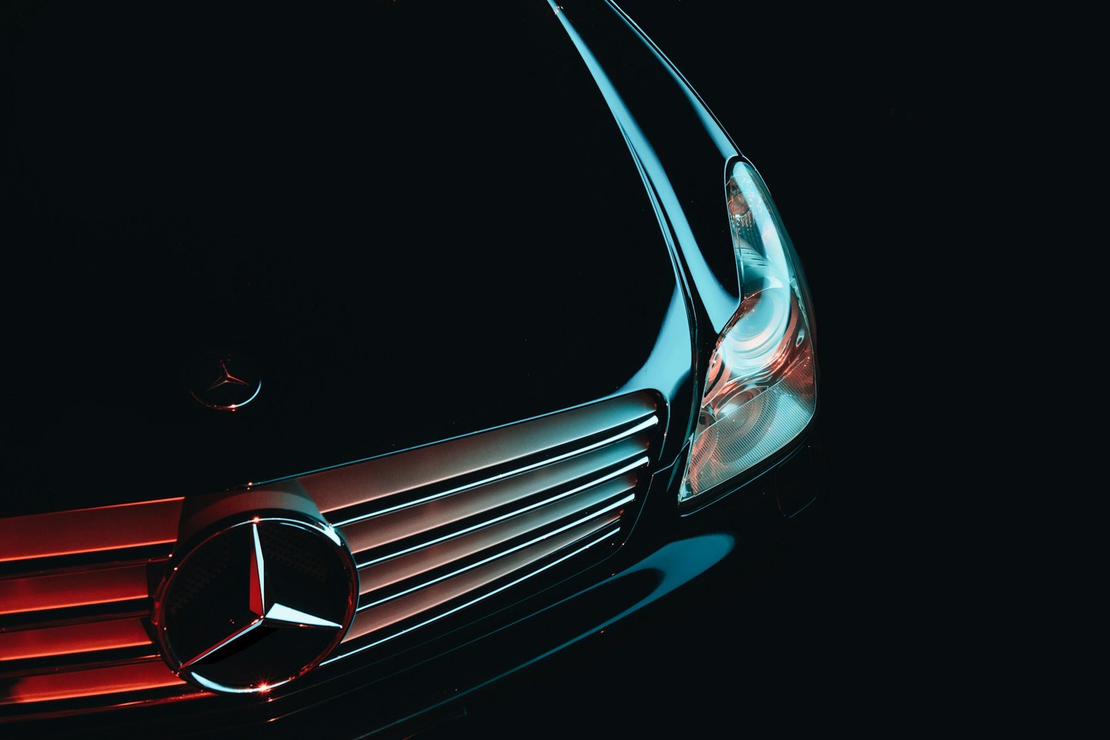 Dramatically lit Mercedes-Benz, illustrative showroom photograph